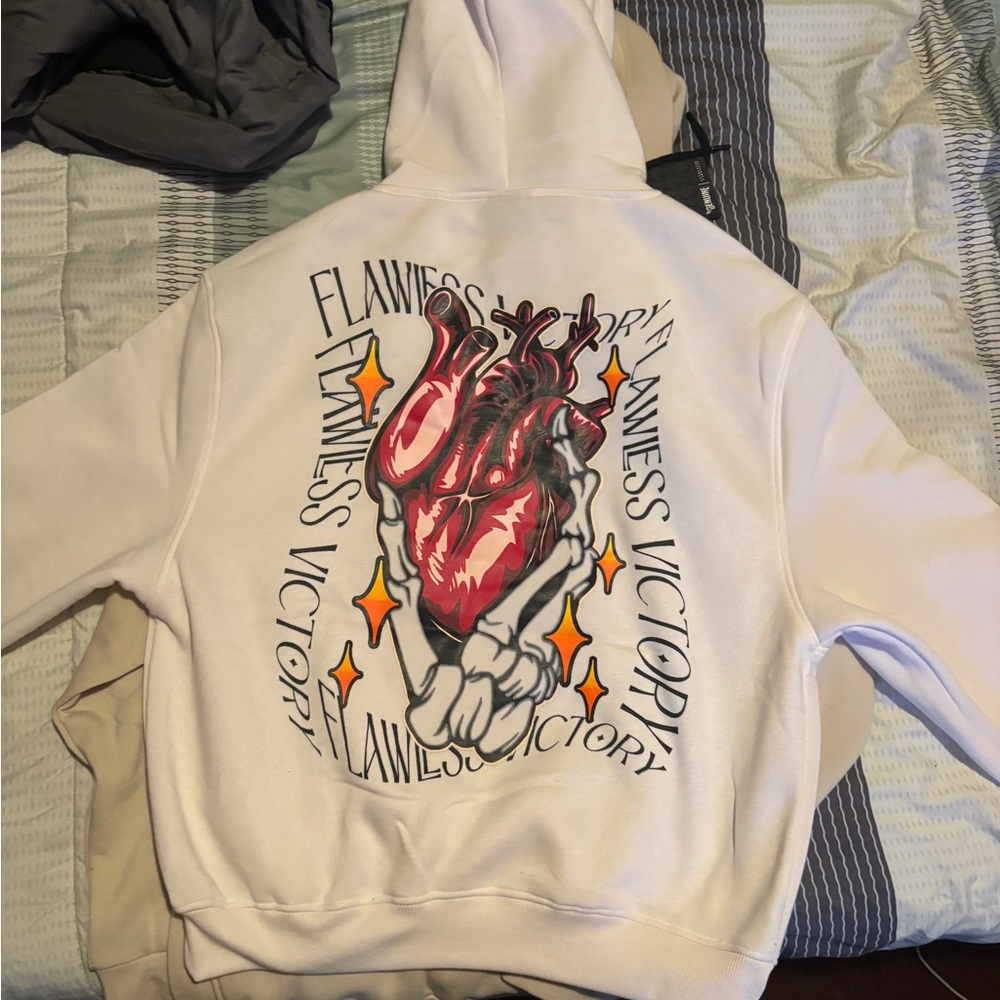 Genuine Merchandise White Hoodie with Red and Black Design